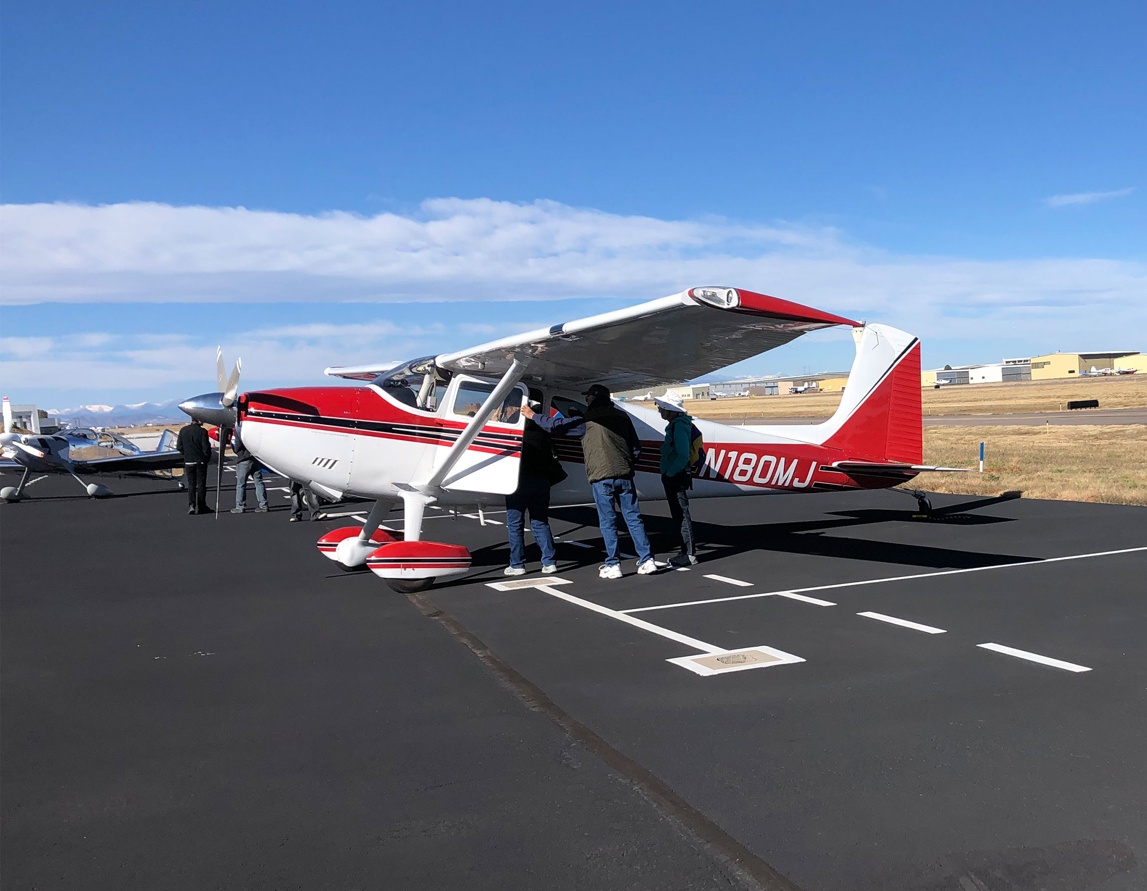 Guests view aircraf on the ramp at Exploration of Flight