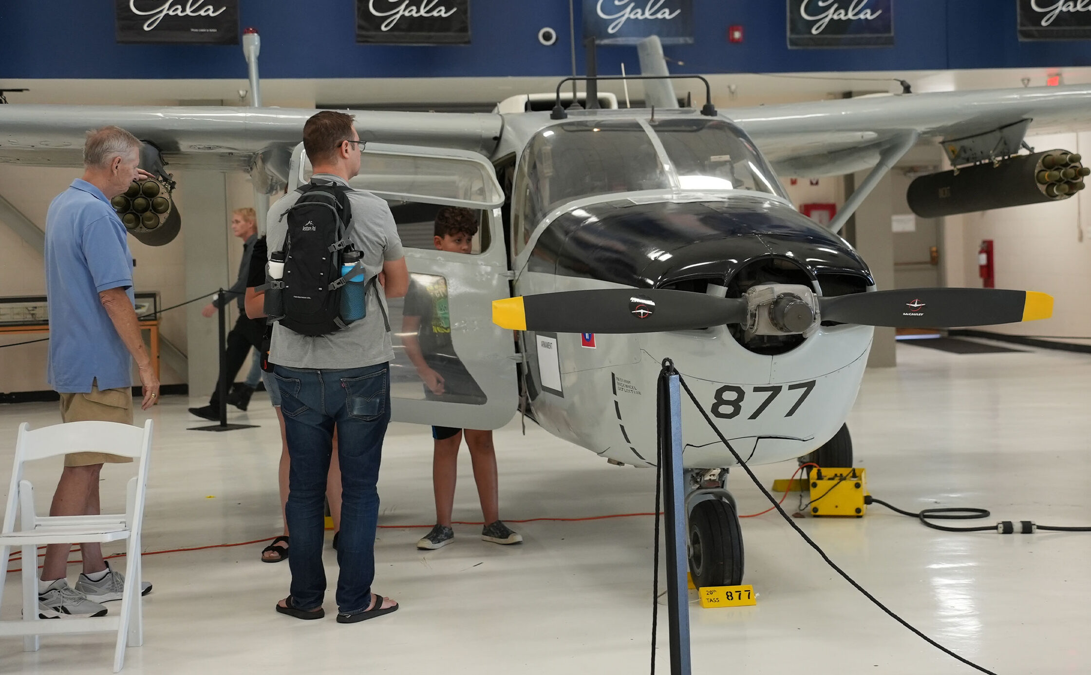 Guests looking inside of the O-2 Skymaster