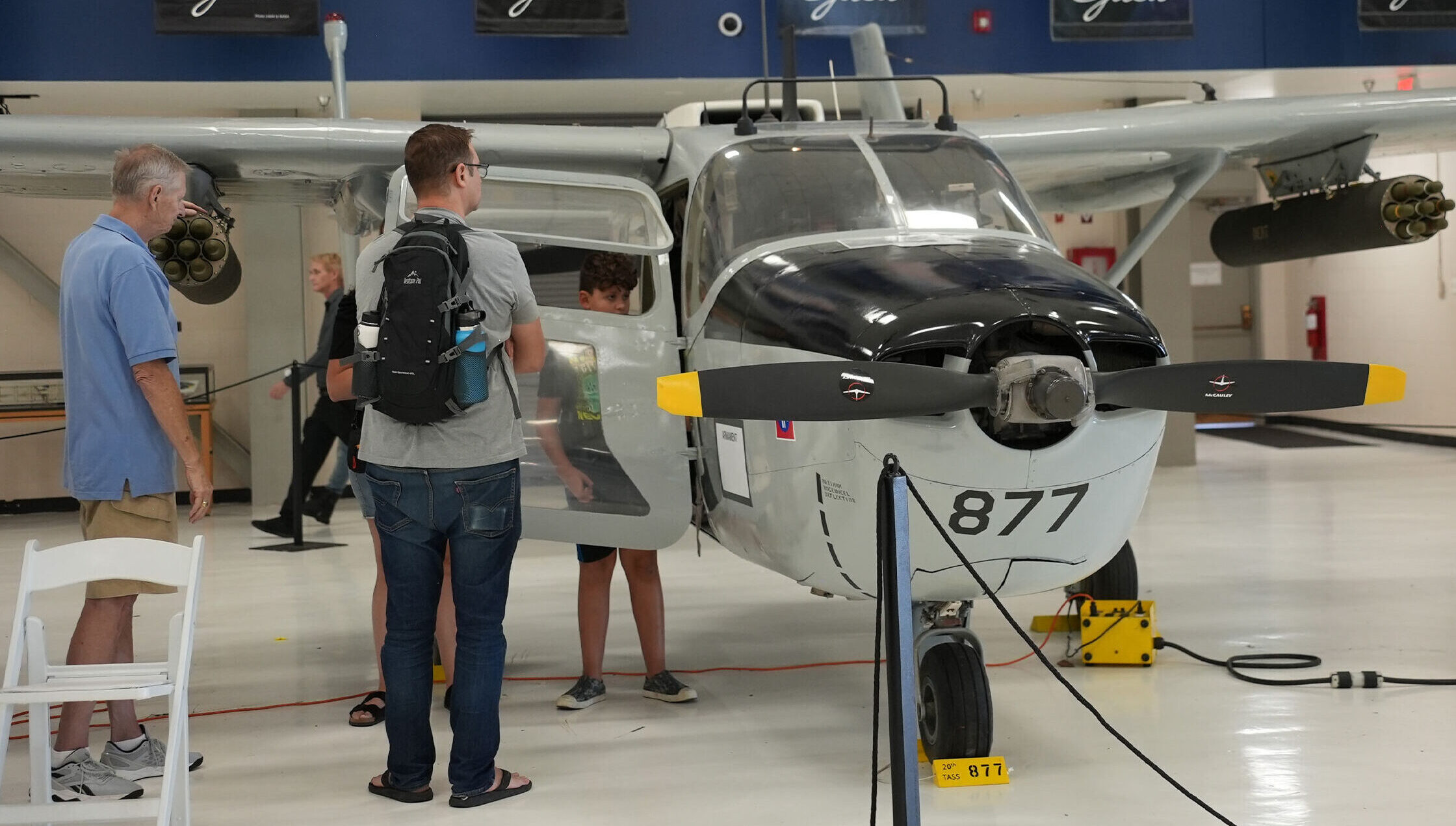 Guests looking inside of the O-2 Skymaster