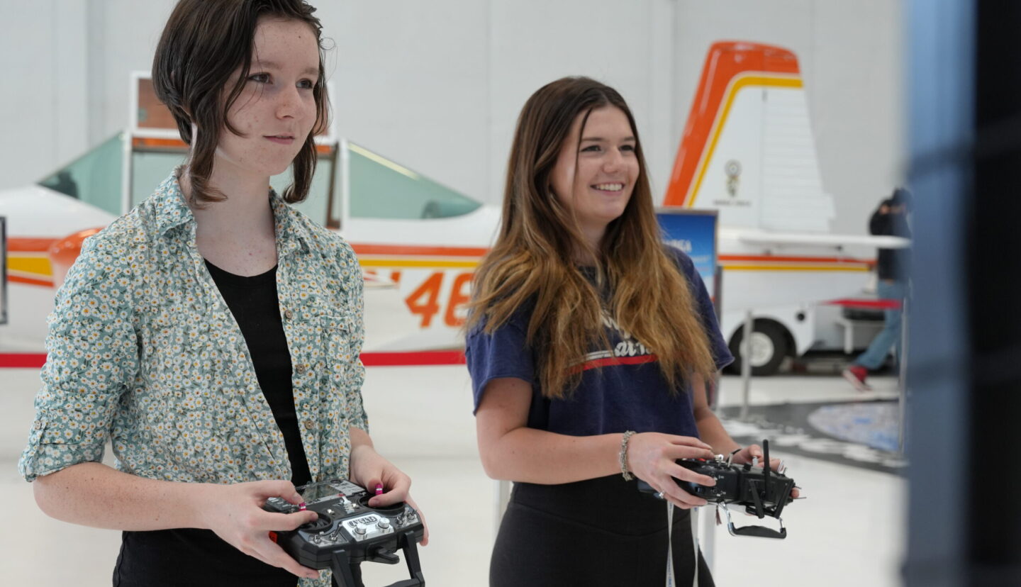 Girls playing drone soccer