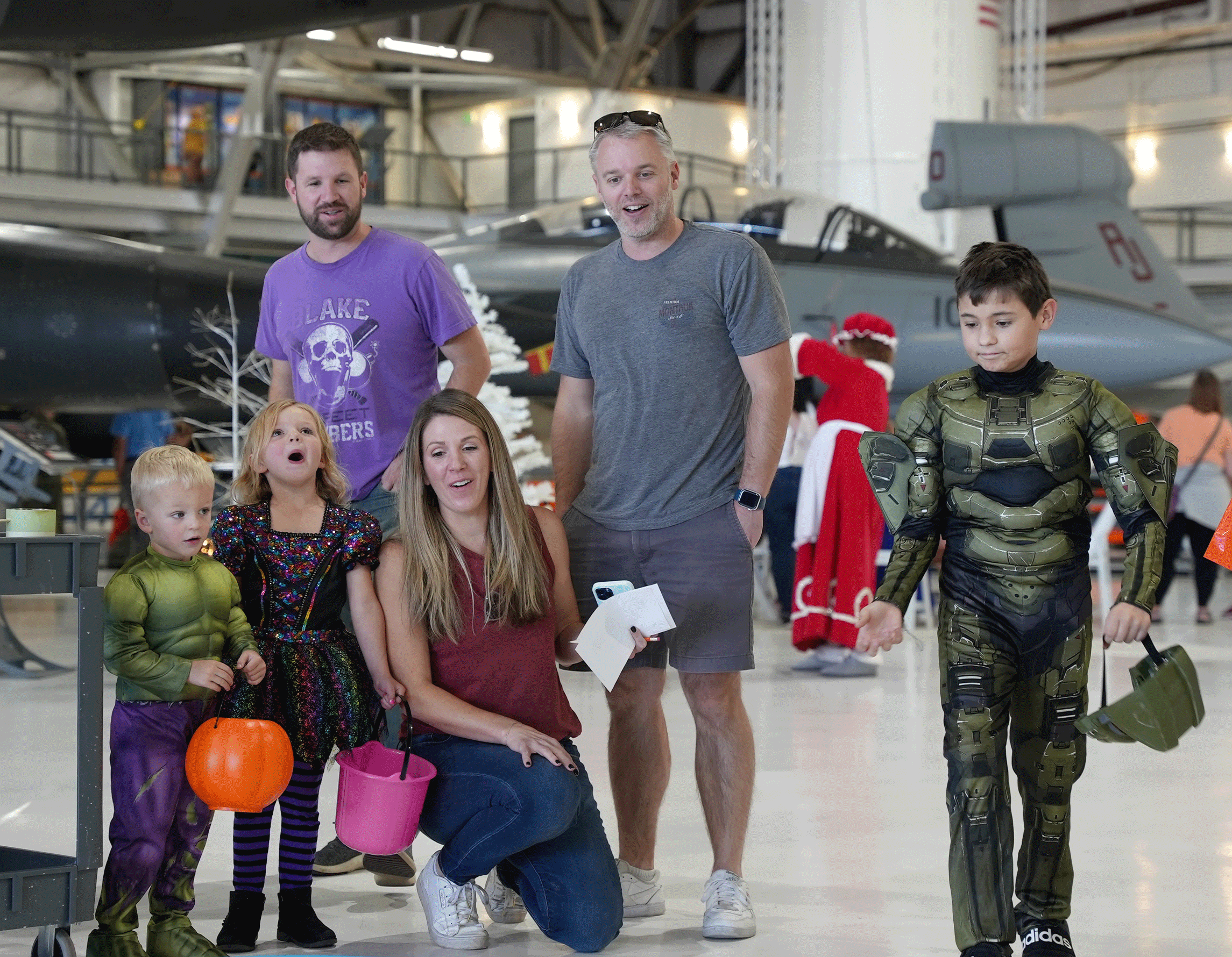 Family in costume at Hauntings in the Hangar