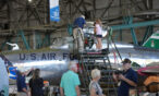 Kids look inside the cockpit of an aircraft