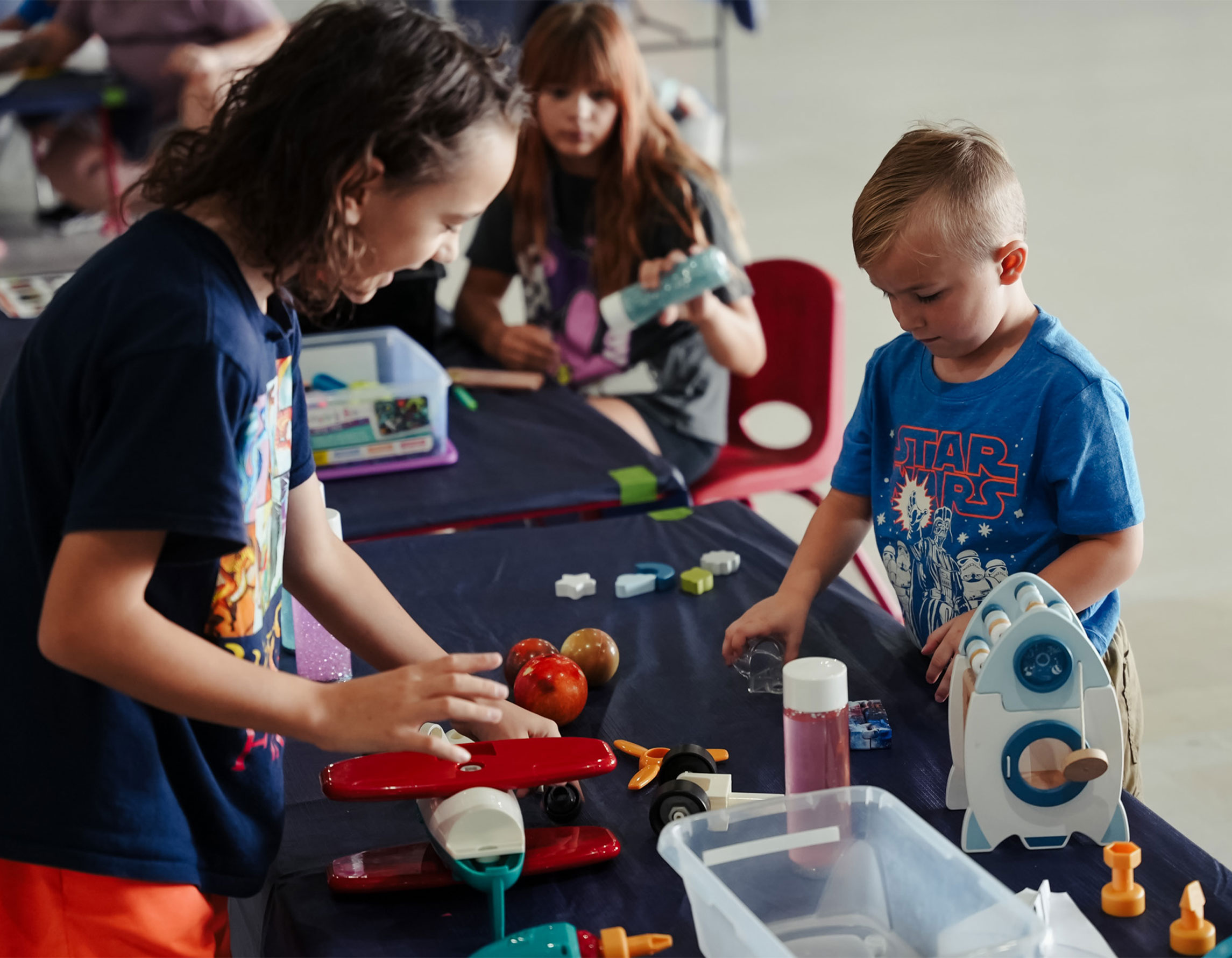 Children playing with manipulatives at Sensory Friendly Hours