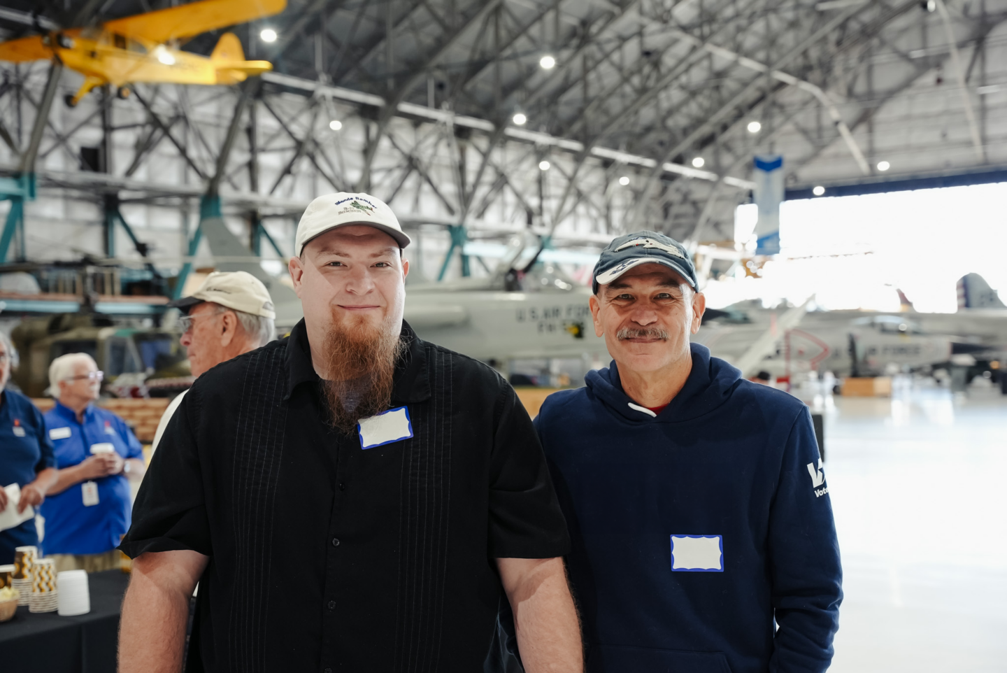 Veterans smiling during Veterans Coffee Hour