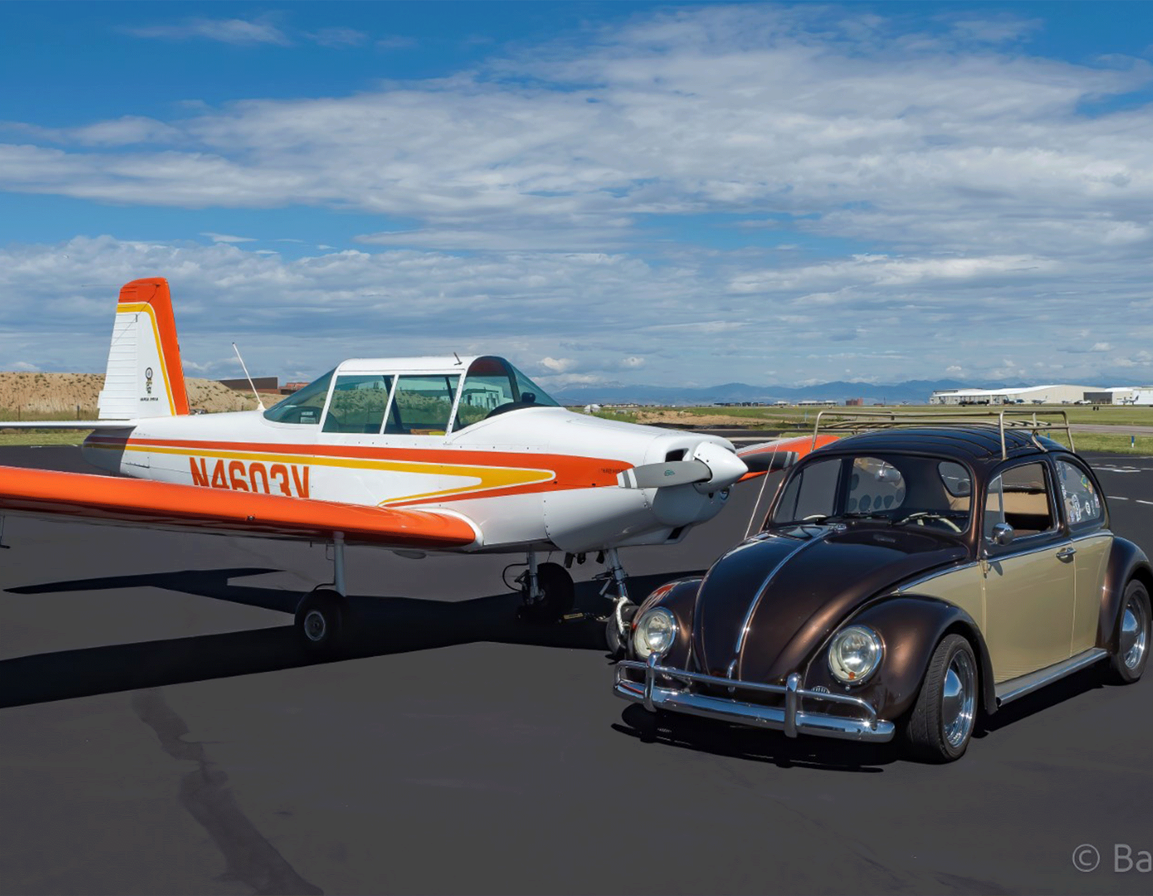 Varga airplane and vintage VW beetle car