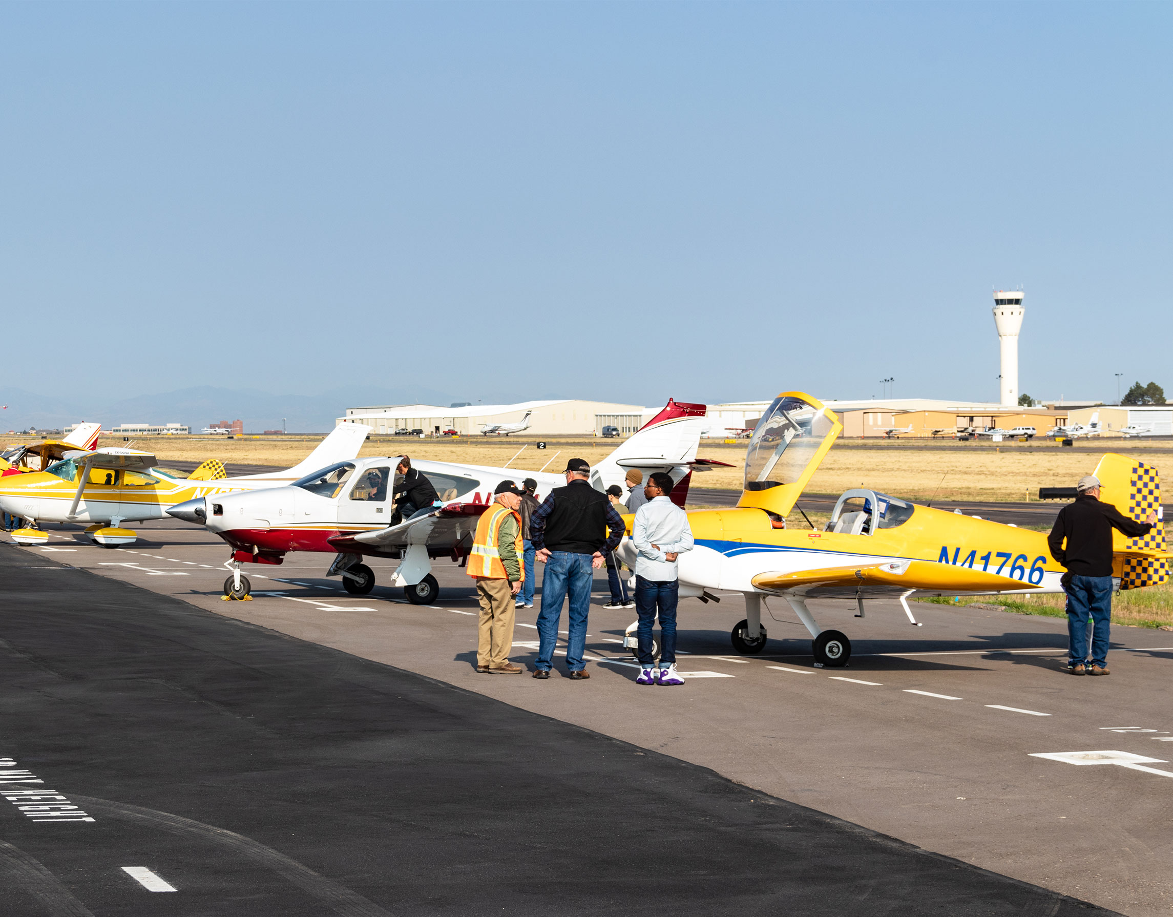 People viewing aircraft on the ramp