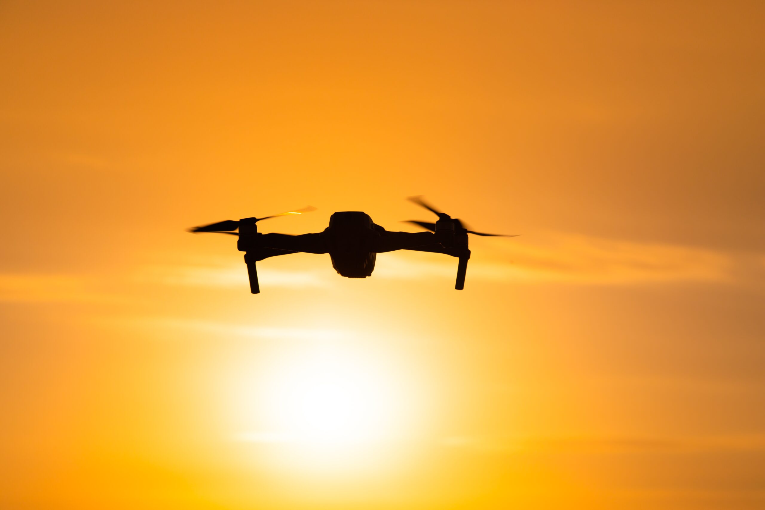 Drone flying in the sun