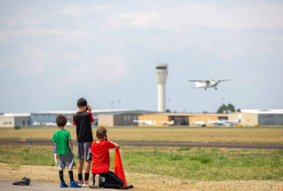 Wings Museum History - Kids on airport runway